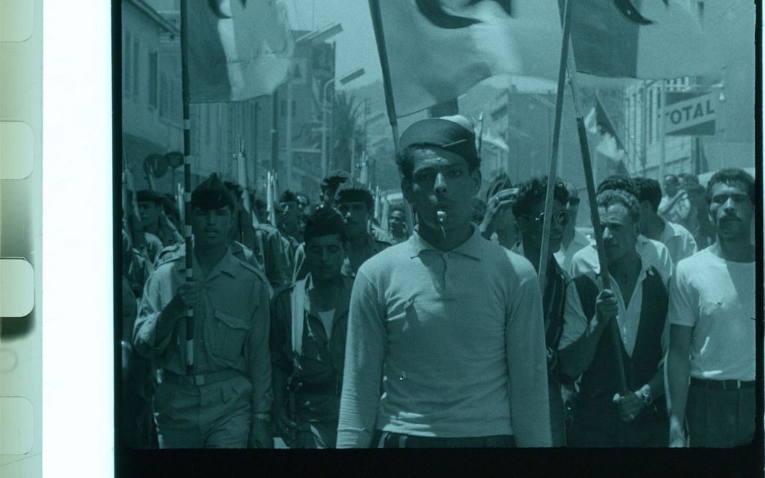 A film strip depicting a scene at a demonstration.