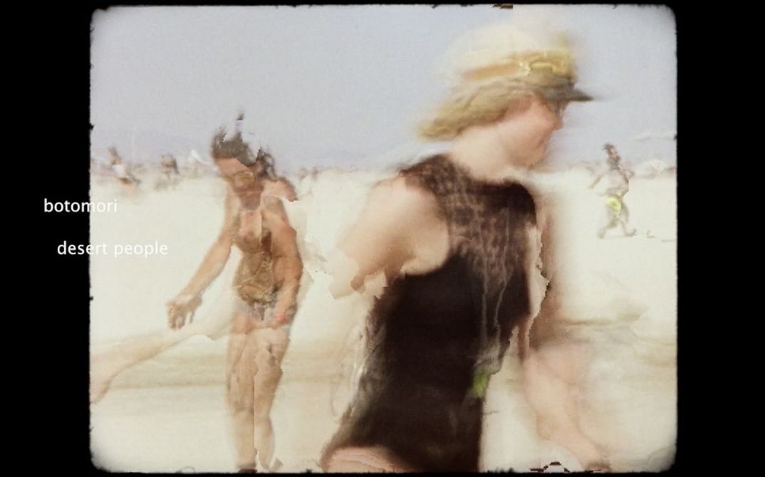 Women on the beach in swimming costumes and bikinis. The shot looks like a negative copy of an analogue film image with visible image distortions