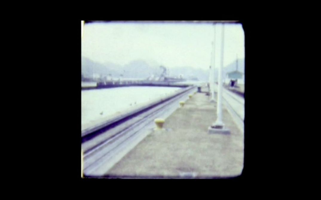 Still from the film "El veterano (The Veteran)" by Jeronimo Rodriguez. We see a grainy shot of a train platform.