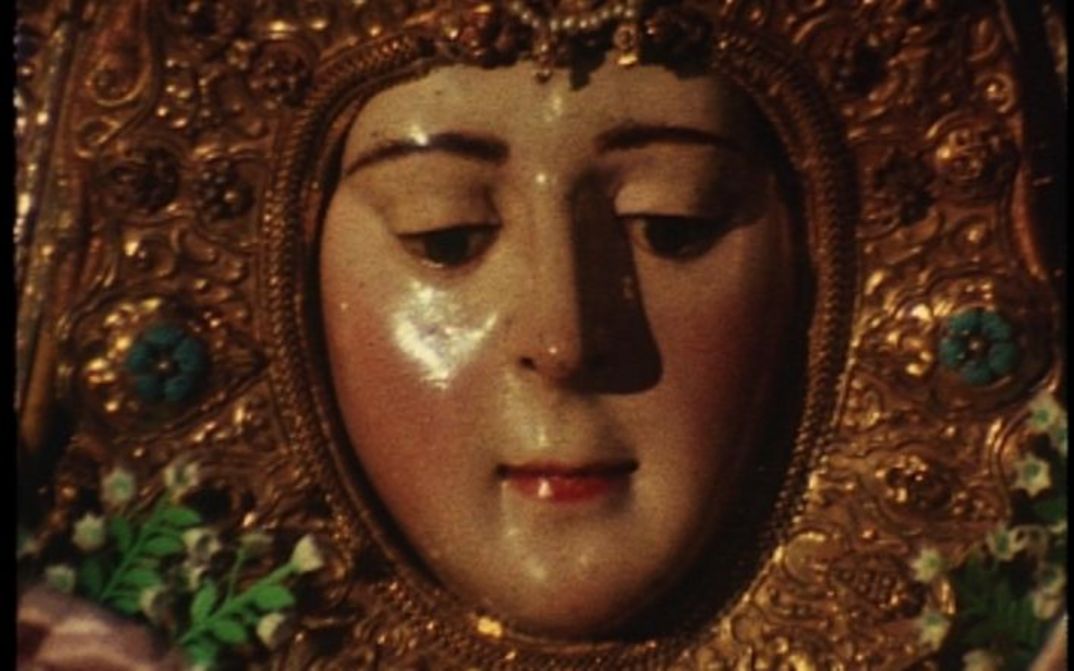 Film still from ROCÍO: View of a statue of a saint.